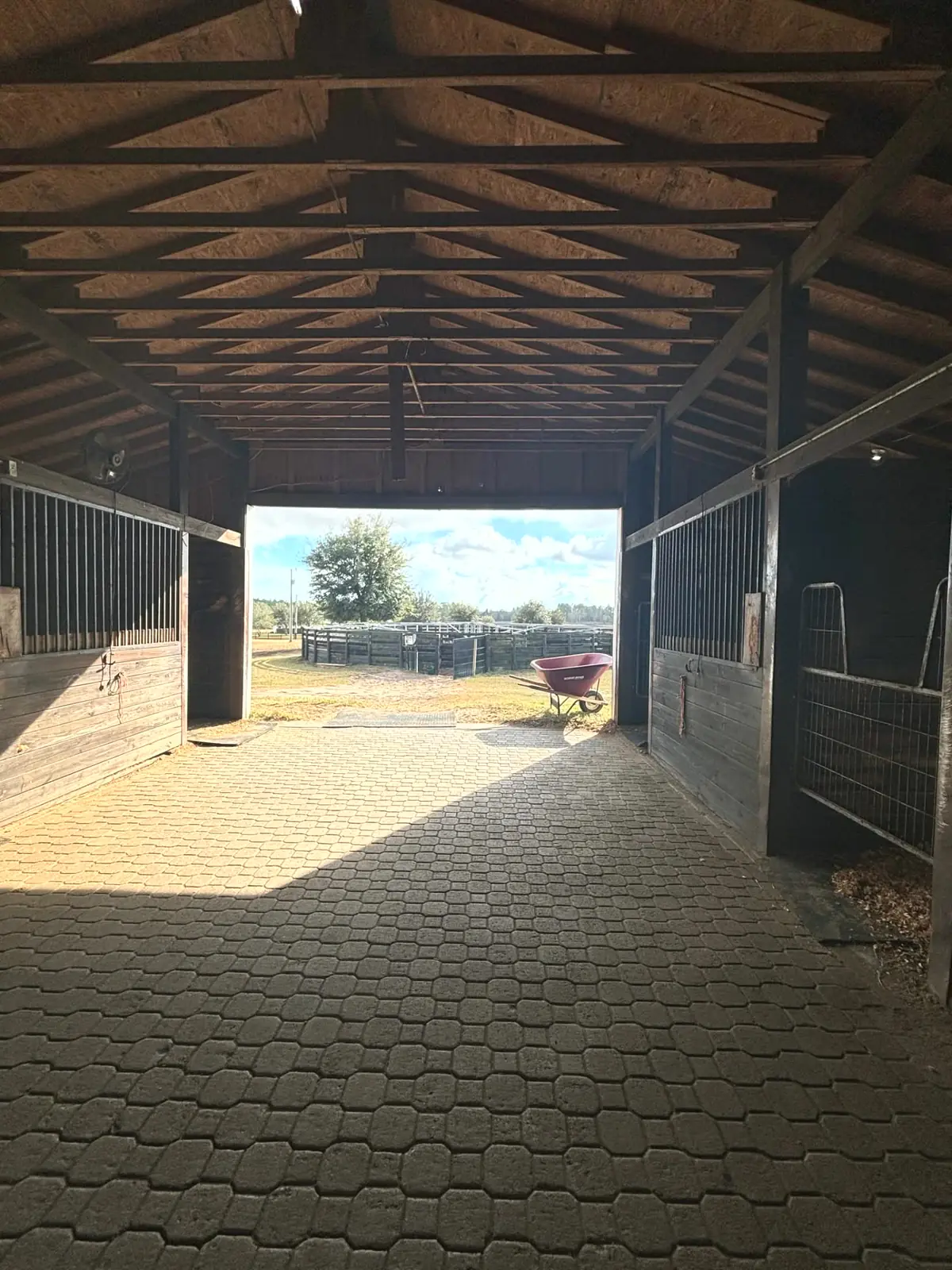 View from the Lot 3 barn aisle out toward the round pen