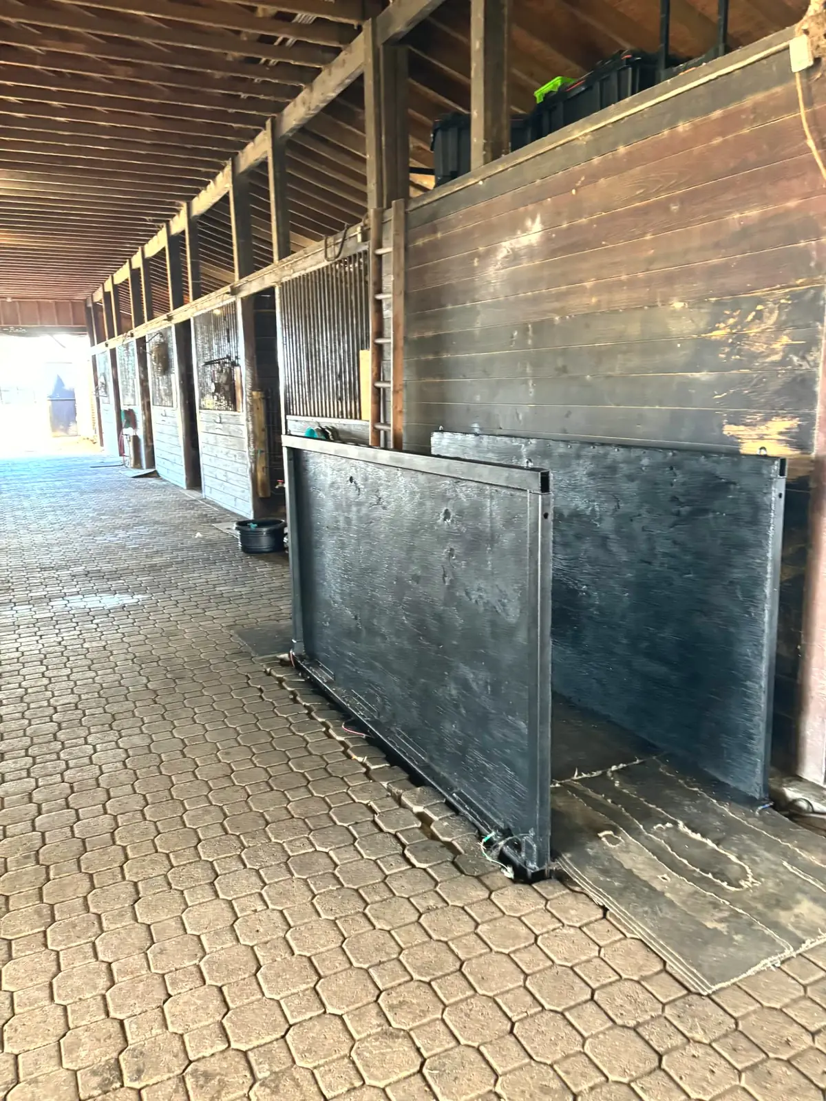 Stall fronts and steel panels inside the Lot 3 barn